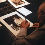 Barney Rosset signing his photographs. 61 Fourth Ave., New York City, 1998. Photo: Astrid Myers.