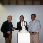 Barney Rosset, Joy Glass, Richard Milazzo, standing behind sculpture by Abraham David Christian, Evergreen Review Art Auction and Exhibition, curated by Richard Milazzo, 644 Broadway, New York, May 7-22, 1998. Photo: Astrid Myers.